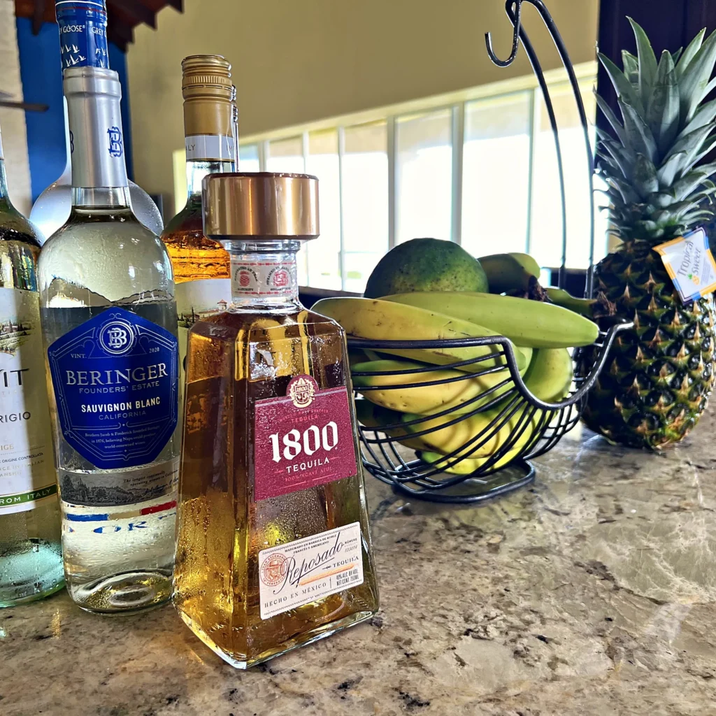 tequila-wine-and-fresh-pineapple-on-the-counter